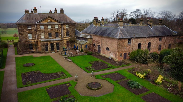 Aerial shot of the south-facing formal garden in winter at Ormesby Hall